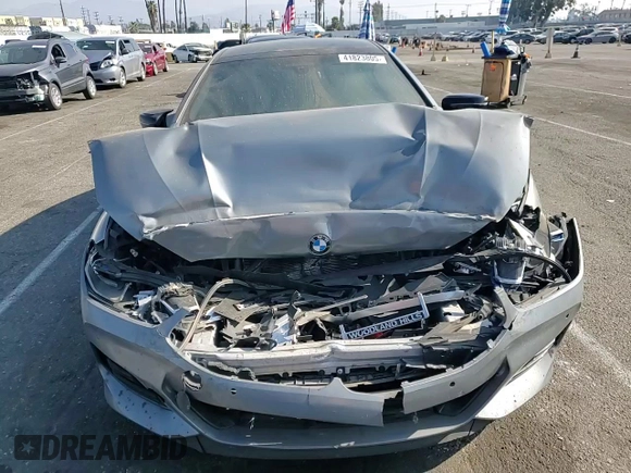 2023 BMW 8 Series M850i z VIN WBAGV8C0XPCK42813, wystawiony jako Copart lot #41823805 z przebiegiem Nie podano mil oraz Szkoda całkowita • Salvage title. Historia ofert i sprzedaży dostępna na DreamBid. Obrazek 11.