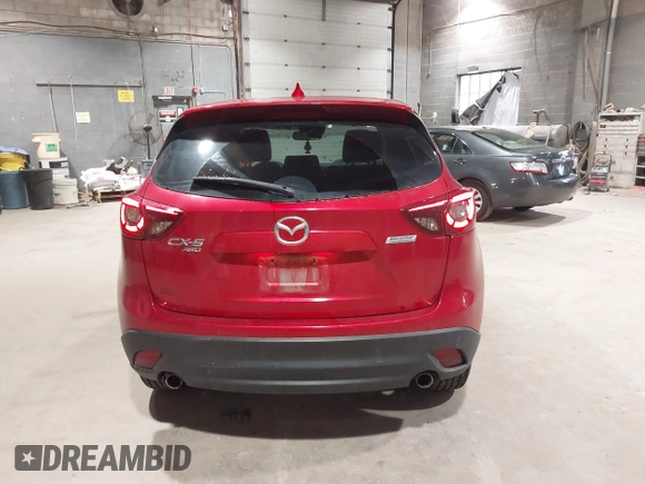 2016 Mazda CX-5 Grand Touring with VIN JM3KE4DY6G0690923, listed as a IAAI auction lot 41875553 with 179,489 mi miles. Bid and sale history available at carsss.com. Image 16.