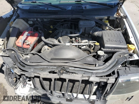 2004 Jeep Grand Cherokee Laredo with VIN 1J4GW48S34C430923, listed as a Copart auction lot 53742105 with 194,372 mi miles and Salvage Title. Bid and sale history available at carsss.com. Image 12.