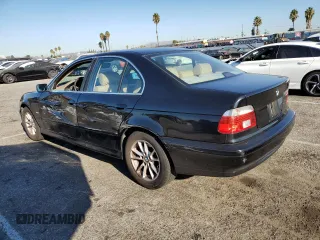 2003 BMW 5 Series 525i with VIN WBADT33433GF43797, listed as a Copart auction lot 70476904 with 194,319 mi miles and Salvage Title. Bid and sale history available at carsss.com. Image 2.