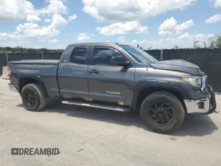 2019 Toyota Tundra SR with VIN 5TFRM5F13KX141745, listed as a Copart auction lot 56910955 with 67,856 mi miles and Salvage title. Bid and sale history available at DreamBid. Image 4.