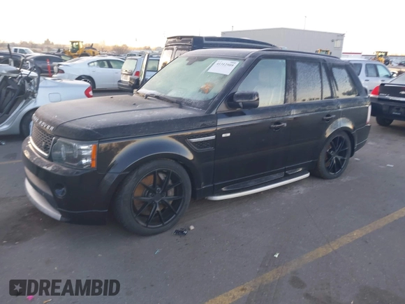 2013 Land Rover Range Rover Sport SC with VIN SALSH2E42DA795635, listed as a IAAI auction lot 41312989 with 144,698 mi miles. Bid and sale history available at carsss.com. Image 2.