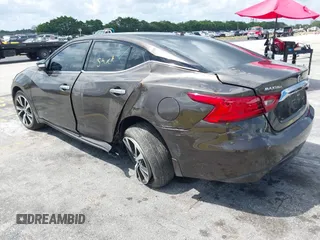 2016 Nissan Maxima SR with VIN 1N4AA6AP9GC405420, listed as a IAAI auction lot 41933739 with 59,680 mi miles and . Bid and sale history available at DreamBid. Image 3.
