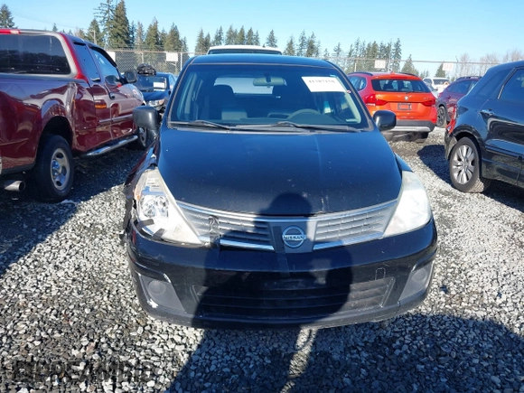 2009 Nissan Versa 1.8 SL with VIN 3N1BC13E59L406937, listed as a IAAI auction lot 41387158 with 149,234 mi miles. Bid and sale history available at carsss.com. Image 12.