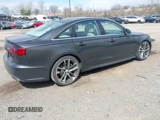 2016 Audi A6 2.0T Premium Plus with VIN WAUGFAFC7GN095669, listed as a IAAI auction lot 41894313 with 84,725 mi miles. Bid and sale history available at carsss.com. Image 4.
