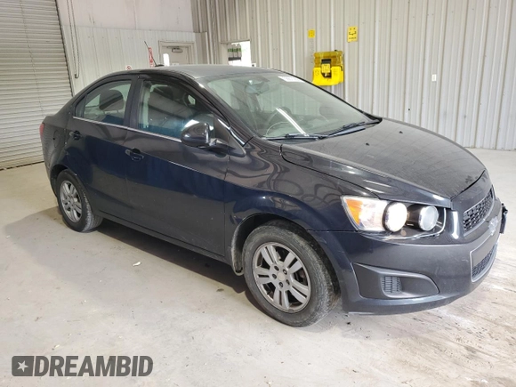 2015 Chevrolet Sonic LT with VIN 1G1JC5SH9F4164028, listed as a Copart auction lot 58870255 with 140,579 mi miles and Clean title. Bid and sale history available at DreamBid. Image 4.