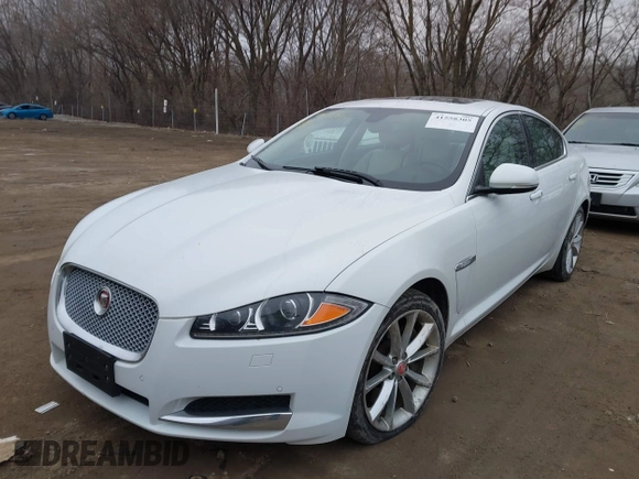 2015 Jaguar XF V6 Portfolio with VIN SAJWJ0FF2F8U59934, listed as a IAAI auction lot 41558305 with 120,219 mi miles. Bid and sale history available at carsss.com. Image 2.