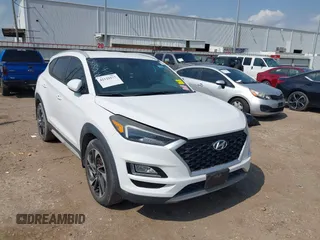 2019 Hyundai Tucson Sport with VIN KM8J33AL1KU861698, listed as a IAAI auction lot 42129173 with 100,160 mi miles. Bid and sale history available at carsss.com. Image 1.