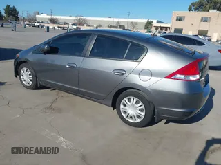 2010 Honda Insight LX with VIN JHMZE2H50AS019740, listed as a IAAI auction lot 41665527 with 74,022 mi miles and . Bid and sale history available at DreamBid. Image 3.