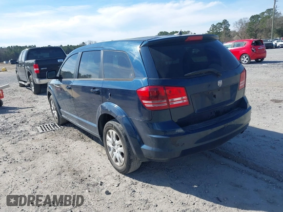 2014 Dodge Journey SE with VIN 3C4PDCABXET277723, listed as a IAAI auction lot 41709752 with 161,587 mi miles and . Bid and sale history available at DreamBid. Image 3.