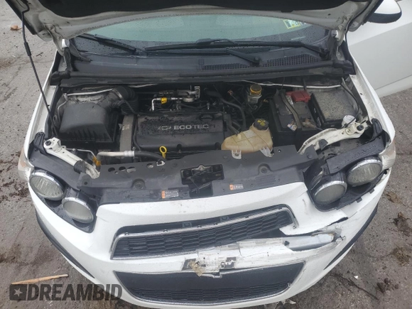 2014 Chevrolet Sonic LT z VIN 1G1JC5SH7E4160011, wystawiony jako Copart lot #57532945 z przebiegiem 136 185 mil mil oraz Szkoda całkowita • Salvage title. Historia ofert i sprzedaży dostępna na DreamBid. Obrazek 11.