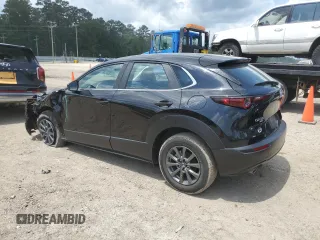 2023 Mazda CX-30 S with VIN 3MVDMBAM6PM513651, listed as a Copart auction lot 57432955 with 49,851 mi miles and Salvage title. Bid and sale history available at DreamBid. Image 2.