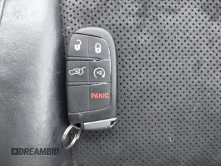 2018 Jeep Grand Cherokee Laredo E with VIN 1C4RJFAG6JC256341, listed as a IAAI auction lot 41635752 with 52,184 mi miles and . Bid and sale history available at DreamBid. Image 11.