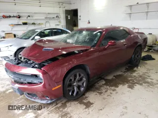 2018 Dodge Challenger T/A with VIN 2C3CDZBTXJH338939, listed as a Copart auction lot 58698025 with 93,787 mi miles and Salvage title. Bid and sale history available at DreamBid. Image 1.