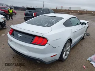 2019 Ford Mustang EcoBoost with VIN 1FA6P8TH6K5201919, listed as a IAAI auction lot 41556322 with 100,568 mi miles and . Bid and sale history available at carsss.com. Image 4.
