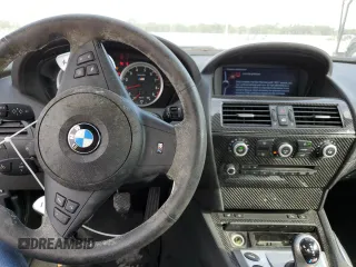 2010 BMW M6 z VIN WBSEH9C53ACY25369, wystawiony jako Copart lot #35884113 z przebiegiem 45 052 mil mil oraz Szkoda całkowita • Salvage title. Historia ofert i sprzedaży dostępna na DreamBid. Obrazek 8.