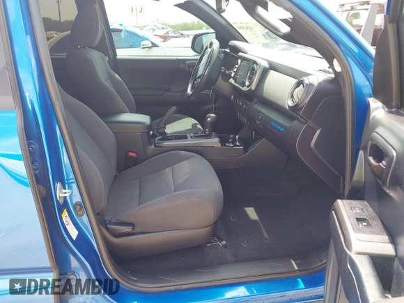 2018 Toyota Tacoma SR5 z VIN 5TFAZ5CN2JX064452, wystawiony jako IAAI lot #41945468 z przebiegiem 132 450 mil mil oraz . Historia ofert i sprzedaży dostępna na DreamBid. Obrazek 5.