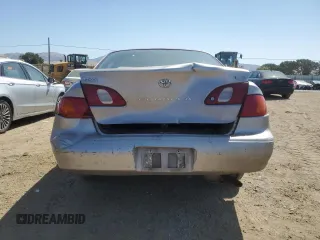 1998 Toyota Corolla VE with VIN 1NXBR18E6WZ080700, listed as a Copart auction lot 58605135 with 214,928 mi miles and Salvage title. Bid and sale history available at DreamBid. Image 6.