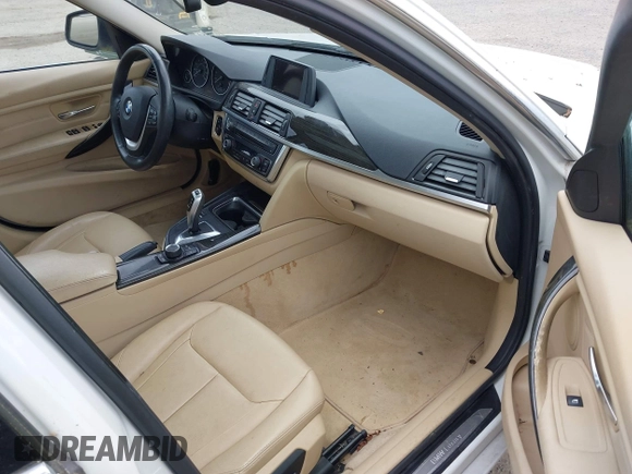 2012 BMW 3 Series 328i with VIN WBA3A5C56CF340427, listed as a IAAI auction lot 42246689 with 149,419 mi miles and . Bid and sale history available at DreamBid. Image 5.