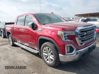 2021 GMC Sierra 1500 SLT z VIN 3GTU9DED8MG202192, wystawiony jako IAAI lot #41028466 z przebiegiem 68 897 mil mil oraz . Historia ofert i sprzedaży dostępna na DreamBid. Obrazek 1.