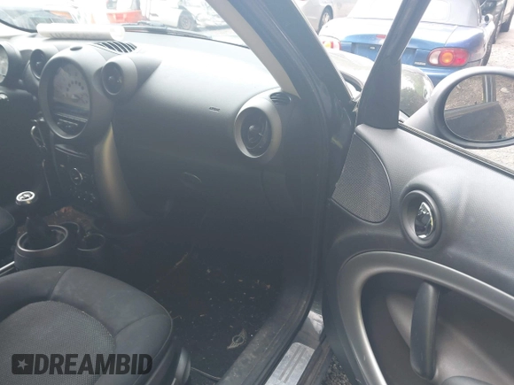 2012 MINI Countryman with VIN WMWZB3C5XCWM30191, listed as a IAAI auction lot 42435291 with 103,254 mi miles and . Bid and sale history available at DreamBid. Image 5.