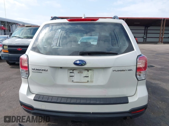 2018 Subaru Forester z VIN JF2SJABC5JH444739, wystawiony jako IAAI lot #42123918 z przebiegiem 124 520 mil mil oraz . Historia ofert i sprzedaży dostępna na DreamBid. Obrazek 17.