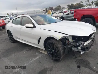2023 BMW 8 Series 840i z VIN WBAGV2C02PCL77961, wystawiony jako IAAI lot #41156644 z przebiegiem 7059 mil mil oraz . Historia ofert i sprzedaży dostępna na DreamBid. Obrazek 1.