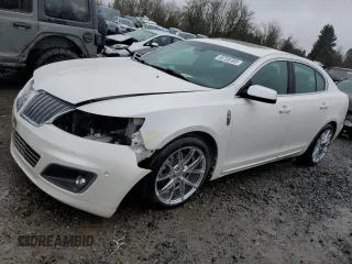 2012 Lincoln MKS EcoBoost with VIN 1LNHL9FT7CG806232, listed as a Copart auction lot 45738185 with 80,388 mi miles and Salvage title. Bid and sale history available at DreamBid. Image 1.