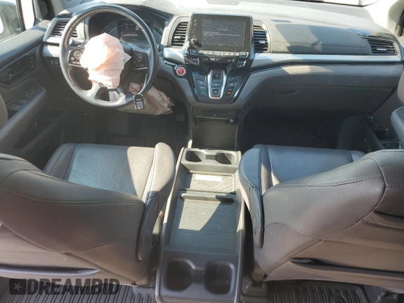 2018 Honda Odyssey Elite with VIN 5FNRL6H95JB062033, listed as a Copart auction lot 63732915 with 105,234 mi miles and Salvage title. Bid and sale history available at DreamBid. Image 8.