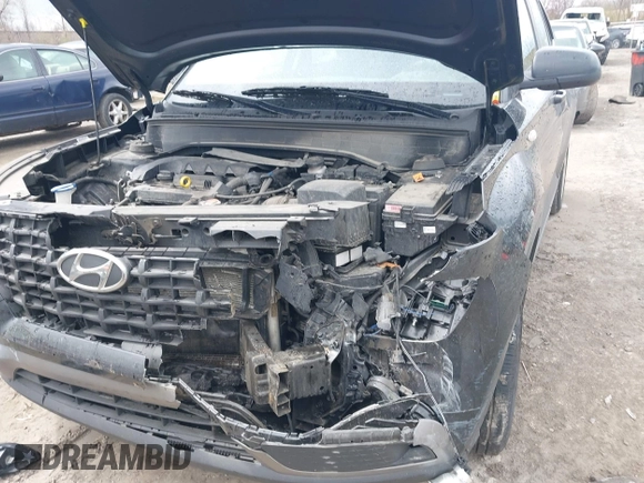 2021 Hyundai Venue SE with VIN KMHRB8A30MU089295, listed as a IAAI auction lot 42037102 with 76,936 mi miles and . Bid and sale history available at DreamBid. Image 6.