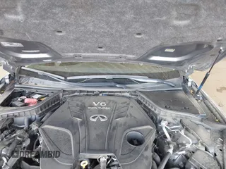 2019 Infiniti Q50 Luxe z VIN JN1EV7AR8KM594171, wystawiony jako IAAI lot #42428037 z przebiegiem 70 086 mil mil oraz . Historia ofert i sprzedaży dostępna na DreamBid. Obrazek 10.