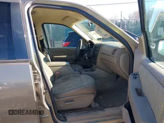 2004 Ford Explorer XLS z VIN 1FMZU72K14UB30298, wystawiony jako IAAI lot #41652053 z przebiegiem 220 713 mil mil oraz . Historia ofert i sprzedaży dostępna na DreamBid. Obrazek 5.
