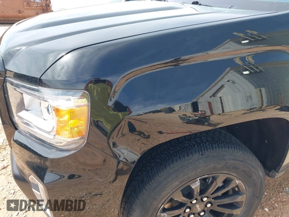 2021 GMC Canyon 2WD Elevation z VIN 1GTG5CEN4M1290149, wystawiony jako IAAI lot #41782863 z przebiegiem 33 807 mil mil oraz . Historia ofert i sprzedaży dostępna na DreamBid. Obrazek 18.