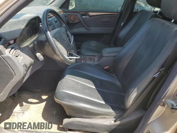 2003 Mercedes-Benz E-Class AWD with VIN WDBJH82J93X088042, listed as a Copart auction lot 70566864 with 167,374 mi miles and Salvage Title. Bid and sale history available at carsss.com. Image 7.
