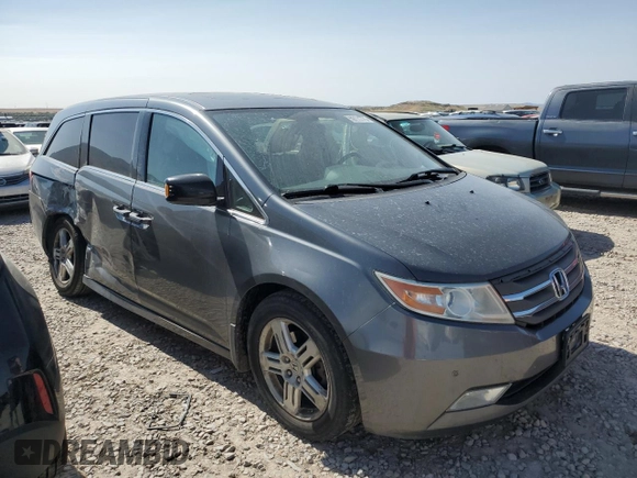 2012 Honda Odyssey Touring с VIN 5FNRL5H95CB120347, выставлен на аукционе Copart как лот 59111775 с пробегом 208 419 миль миль и Списание • Salvage title. История ставок и продаж доступна на DreamBid. Изображение 4.
