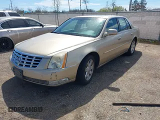 2006 Cadillac DTS w/1SC with VIN 1G6KD57Y86U209092, listed as a IAAI auction lot 41811298 with 156,676 mi miles. Bid and sale history available at carsss.com. Image 2.