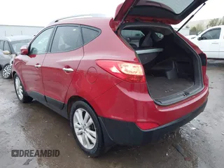 2013 Hyundai Tucson GLS with VIN KM8JU3AC8DU683546, listed as a IAAI auction lot 41956167 with 141,510 mi miles. Bid and sale history available at carsss.com. Image 3.