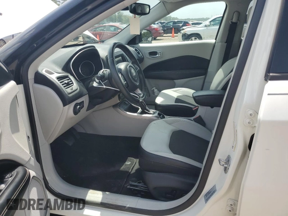 2018 Jeep Compass Latitude with VIN 3C4NJCBB3JT145069, listed as a Copart auction lot 61859665 with 68,476 mi miles and Salvage title. Bid and sale history available at DreamBid. Image 7.