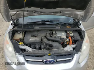 2013 Ford C-Max SE z VIN 1FADP5AUXDL540395, wystawiony jako Copart lot #56885485 z przebiegiem 108 005 mil mil oraz Szkoda całkowita • Salvage title. Historia ofert i sprzedaży dostępna na DreamBid. Obrazek 12.