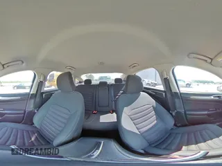 2017 Ford Fusion SE z VIN 3FA6P0H74HR164747, wystawiony jako Copart lot #56139855 z przebiegiem 105 769 mil mil oraz Szkoda całkowita • Salvage title. Historia ofert i sprzedaży dostępna na DreamBid. Obrazek 14.
