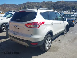 2014 Ford Escape SE with VIN 1FMCU9GX5EUB53378, listed as a IAAI auction lot 41709382 with Not provided miles and . Bid and sale history available at DreamBid. Image 4.