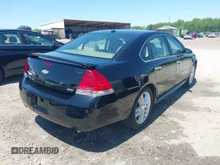 2014 Chevrolet Impala LTZ with VIN 2G1WC5E39E1168726, listed as a IAAI auction lot 42133295 with 146,902 mi miles and . Bid and sale history available at DreamBid. Image 4.