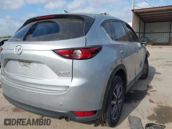 2018 Mazda CX-5 Grand Touring with VIN JM3KFADM6J0325626, listed as a IAAI auction lot 42054702 with 121,952 mi miles and . Bid and sale history available at DreamBid. Image 4.