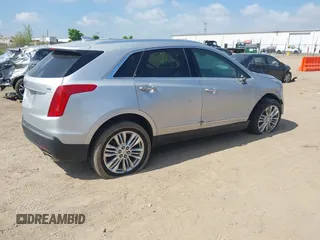 2017 Cadillac XT5 Premium Luxury AWD z VIN 1GYKNERS6HZ112170, wystawiony jako IAAI lot #42262116 z przebiegiem 140 982 mil mil oraz . Historia ofert i sprzedaży dostępna na DreamBid. Obrazek 4.
