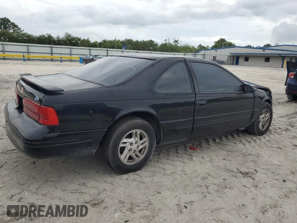 1997 Ford Thunderbird LX z VIN 1FALP62W7VH165149, wystawiony jako Copart lot #56654715 z przebiegiem 155 190 mil mil oraz Szkody całkowita. Historia ofert i sprzedaży dostępna na DreamBid. Obrazek 3.