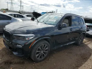 2020 BMW X5 M50i z VIN 5UXJU4C03LLE46062, wystawiony jako Copart lot #54389135 z przebiegiem 59 022 mil mil oraz Czysty tytuł • Clean title. Historia ofert i sprzedaży dostępna na DreamBid. Obrazek 1.