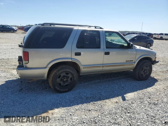 2004 Chevrolet Blazer LS z VIN 1GNDT13X54K166622, wystawiony jako Copart lot #50248605 z przebiegiem 198 301 mil mil oraz Szkoda całkowita • Salvage title. Historia ofert i sprzedaży dostępna na DreamBid. Obrazek 3.