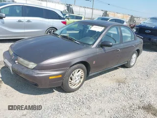 1999 Saturn SL with VIN 1G8ZK5272XZ225139, listed as a IAAI auction lot 42662628 with 223,692 mi miles and . Bid and sale history available at DreamBid. Image 2.