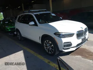 2022 BMW X5 xDrive40i z VIN 5UXCR6C09N9M21945, wystawiony jako IAAI lot #42170363 z przebiegiem 23 537 mil mil oraz . Historia ofert i sprzedaży dostępna na DreamBid. Obrazek 1.