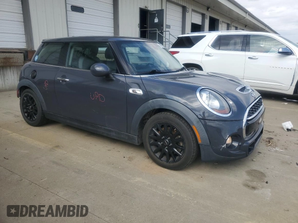 2015 MINI Hardtop S with VIN WMWXP7C59F2A34428, listed as a Copart auction lot 50697285 with 131,564 mi miles and Salvage Title. Bid and sale history available at DreamBid. Image 4.